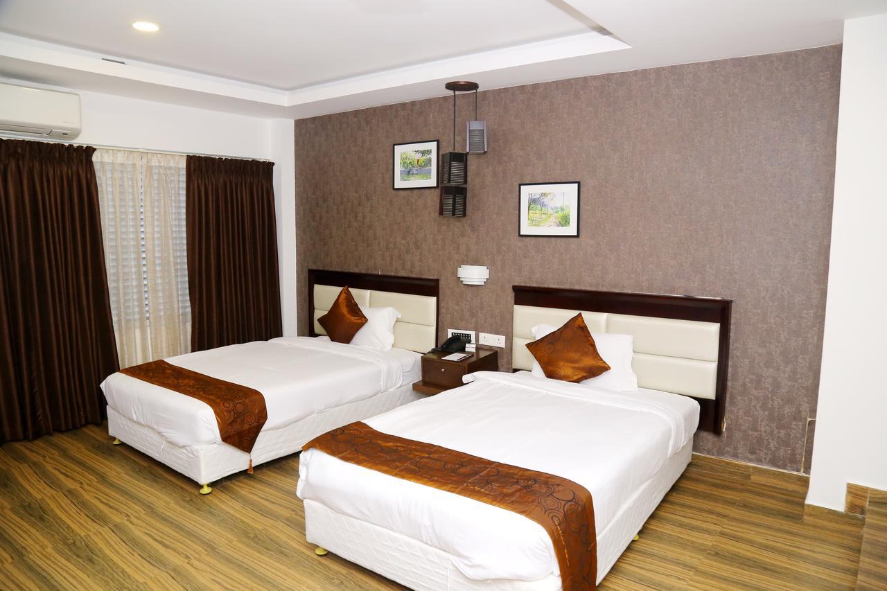 Kga Elite Continental Hotel Tiruvalla Dış mekan fotoğraf