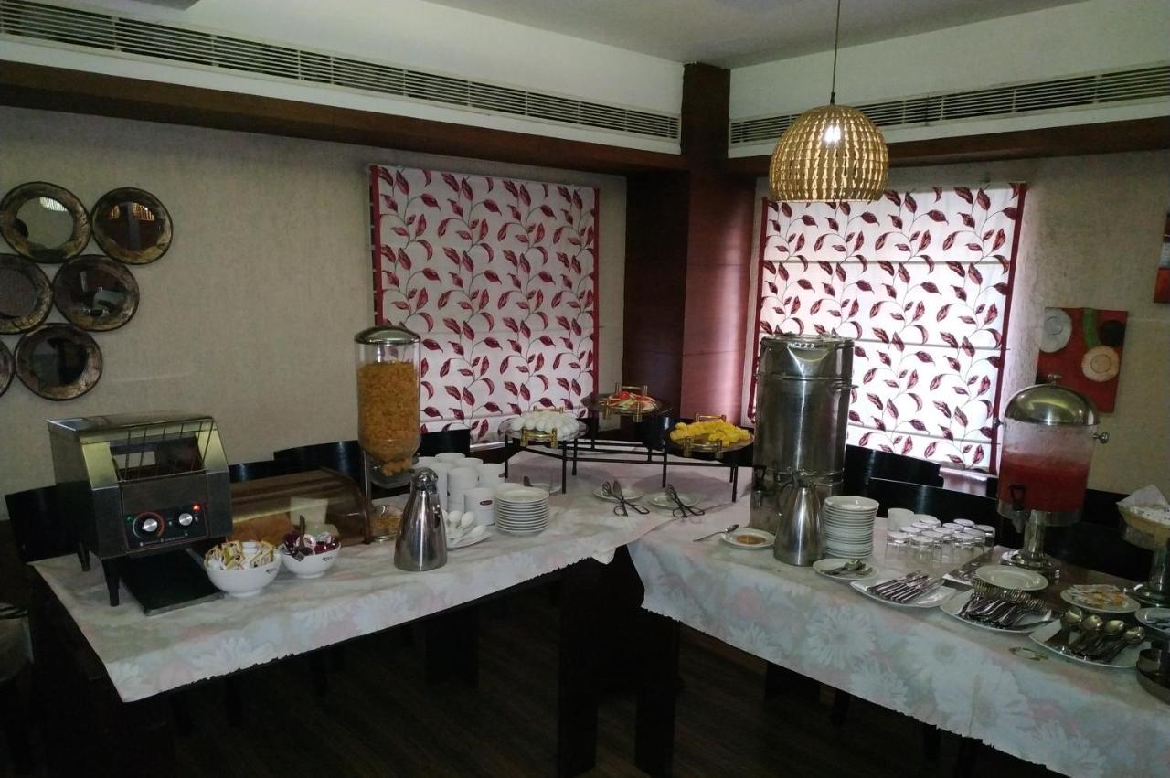 Kga Elite Continental Hotel Tiruvalla Dış mekan fotoğraf